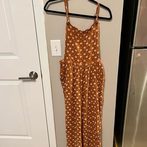 American Eagle Orange Floral Soft Overalls. Gently used condition Size Large